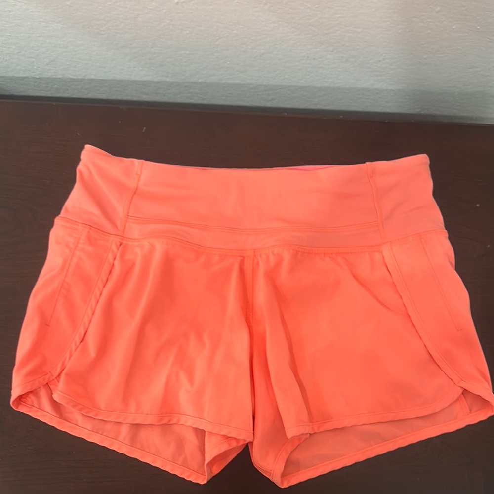 Lululemon Coral Athletic Shorts with Soft Material and Wide Waistband